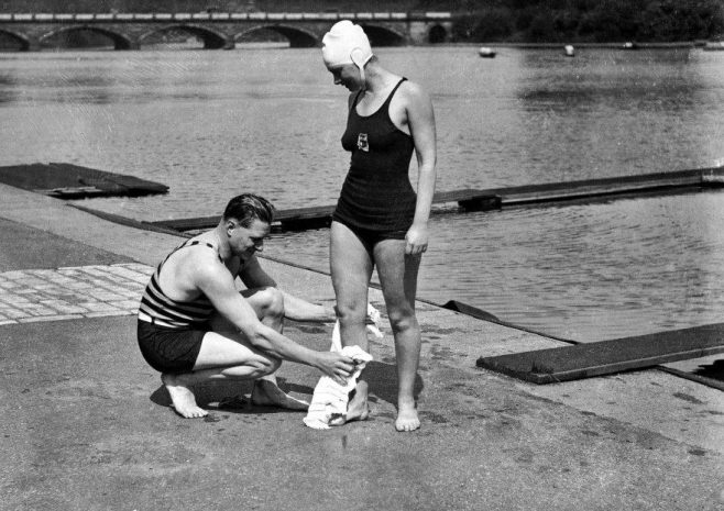 Coleman receiving a towelling down from her trainer. Hyde Park Lido 1932