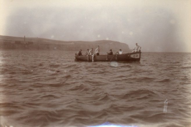Channel swimmer Jabez Wolffe (just visible) swimming alongside crew