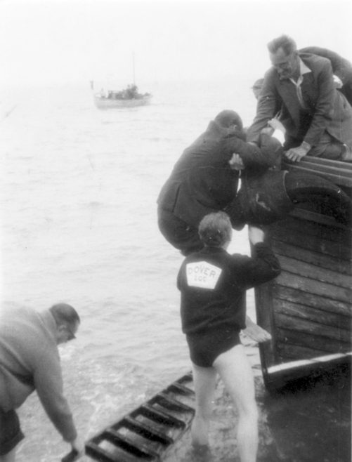 Persons at the Bow of a Vessel