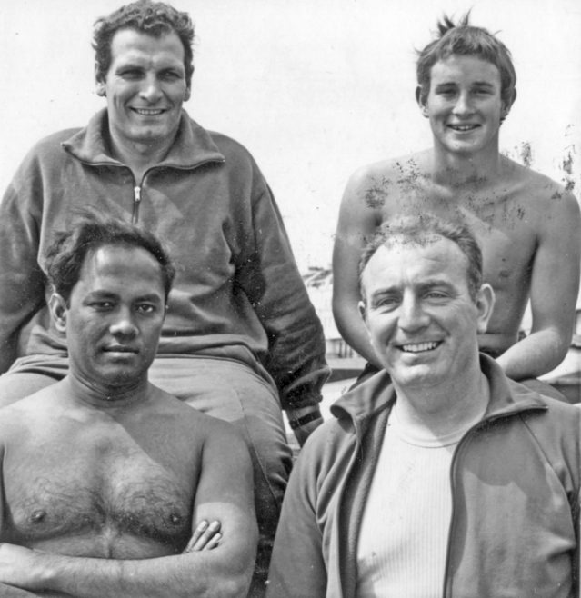 Four male channel swimmers