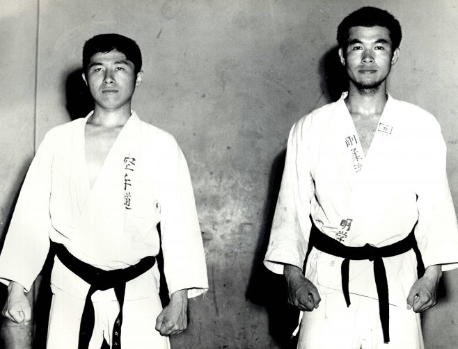 Takaaki Uetsubara with another Male both in Martial Arts Robes