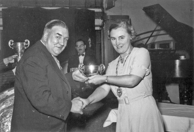 Photograph of a trophy presentation (Jack Burwill) (unidentified)